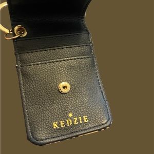 Kedzie card wallet with three slots, never used, smoke free home.